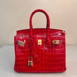 $SOLD$ Genuine leather embossed in crocodile print, 25cm, with gold hardware.